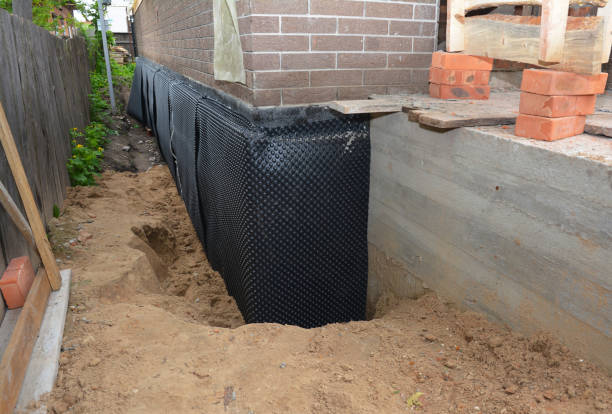 SJ Waterproofing Pros technician performing targeted Foundation Crack Repair assessment in Alden, NY